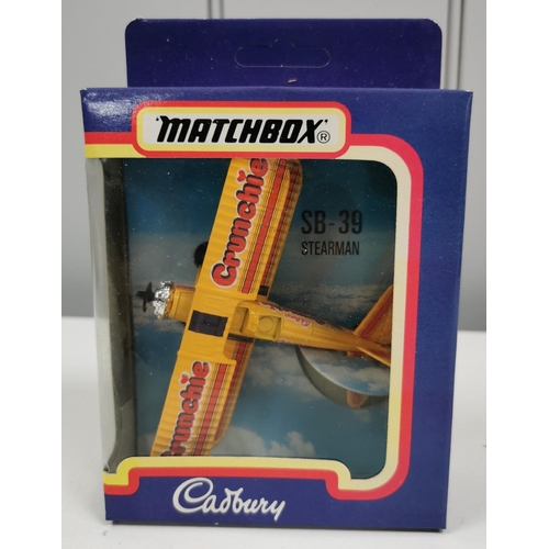 2312 - A collection of nine Matchbox models. To include a boxed Cadbury's bi-plane, two boxed yesteryears, ... 