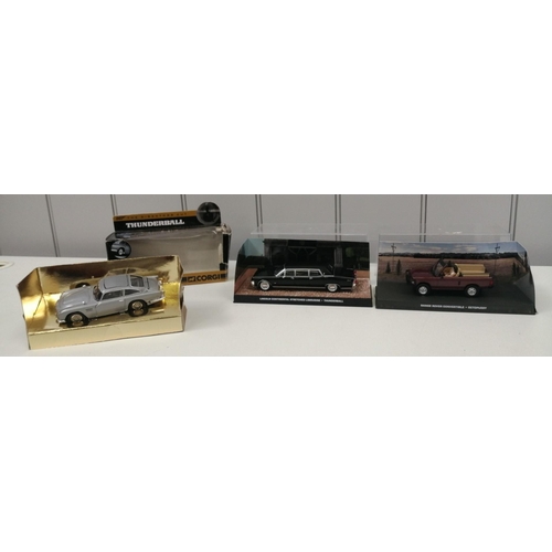 2198 - A collection of three James Bond themed model cars. To include a boxed, 1:32 scale, Corgi Thunderbal... 