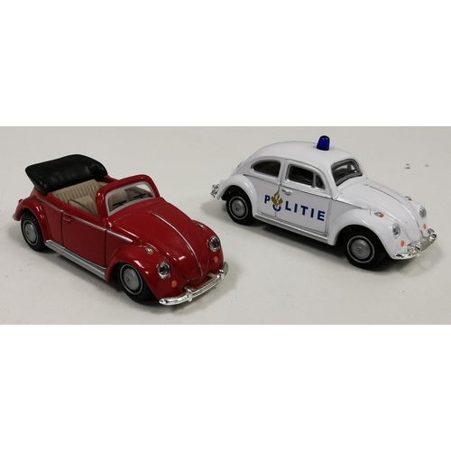 2381 - A collection of Oxford Diecast models. To include a boxed IMR Locomotive, a cased Mini Cooper rally ... 