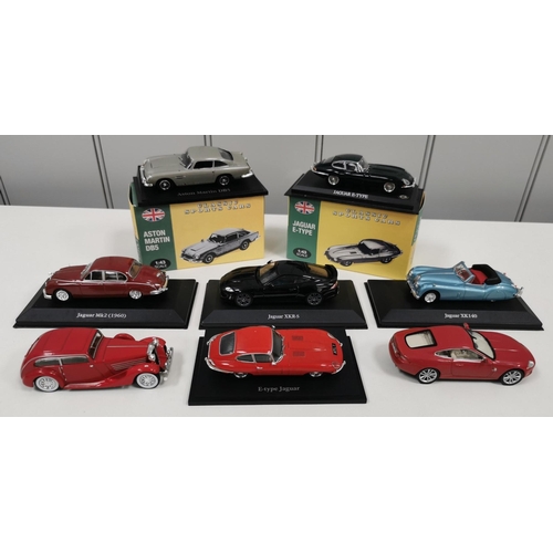 2125 - A collection of two boxed & six unboxed Atlas Editions model sports cars.