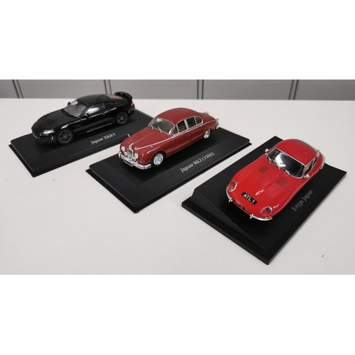 2125 - A collection of two boxed & six unboxed Atlas Editions model sports cars.