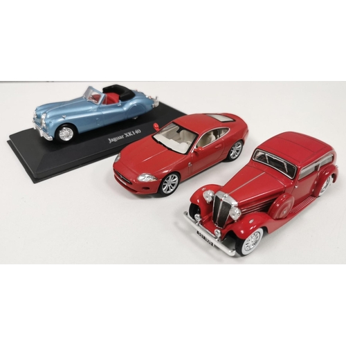 2125 - A collection of two boxed & six unboxed Atlas Editions model sports cars.