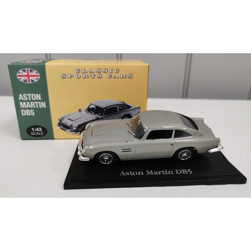 2125 - A collection of two boxed & six unboxed Atlas Editions model sports cars.