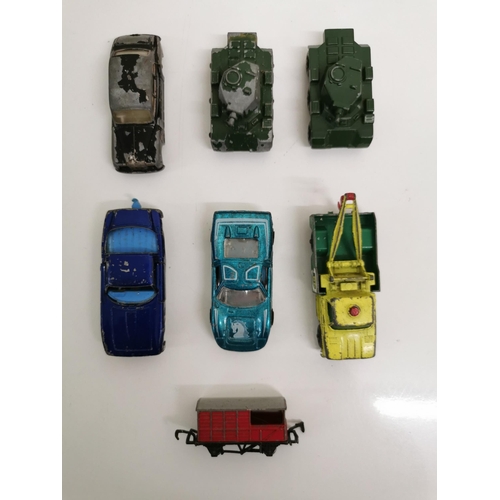 2243 - A collection of approx. twenty-four unboxed/playworn, diecast vehicles, by various manufacturers. To... 