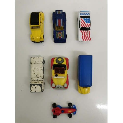 2243 - A collection of approx. twenty-four unboxed/playworn, diecast vehicles, by various manufacturers. To... 