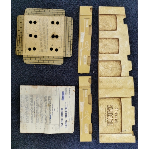 1825 - A quantity of early Tri-Ang Scalextrics items. To include car, controllers, fencing & track.