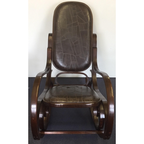 A vintage Bentwood rocking chair, with stained frame & leather seat pad/backrest. Dimensions(cm) H94(48 to seat), W55, D94.