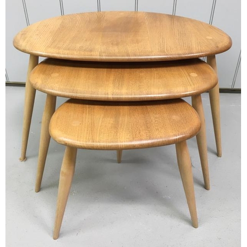 An Ercol Blonde nest of three pebble tables.
Largest dimensions(cm) H40, W66, D44.