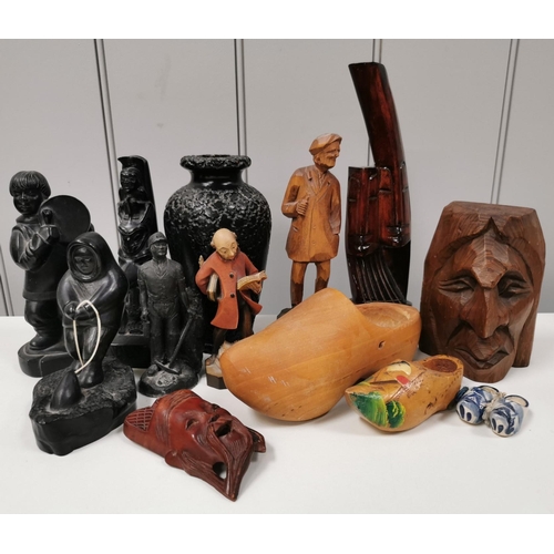 1524 - A collection of (mainly) wooden decorative items. To include masks, vase (including a set of ceramic... 