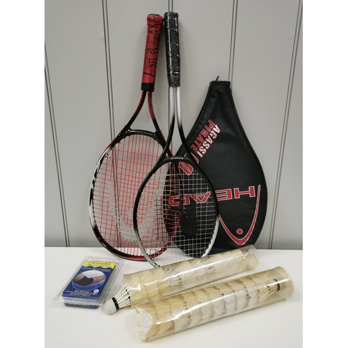 1538 - Two tennis racquets (one with cover), a packaged sleeve support & two sleeves of shuttlecocks.