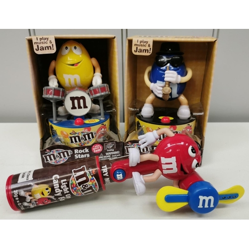 1542 - A collection of three M&M branded toys. To include two boxed (tested & appear in full working order)... 