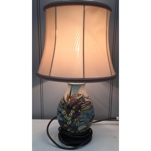 1549 - A 'Moorcroft' table lamp, in the 'Islay' design. Height 27cm. PAT Test pass & functionality test ind... 