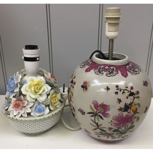 1551 - Two table lamps. One a Chinese floral scene, the other a traditional posy design. Respective Heights... 