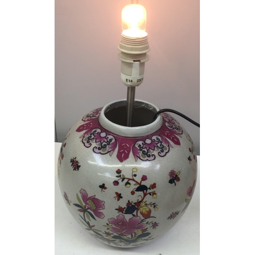 1551 - Two table lamps. One a Chinese floral scene, the other a traditional posy design. Respective Heights... 