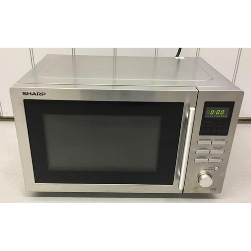 1561 - A stainless-steel Sharp microwave. model no. R-82STM-A. PAT test pass & functionality test indicates... 