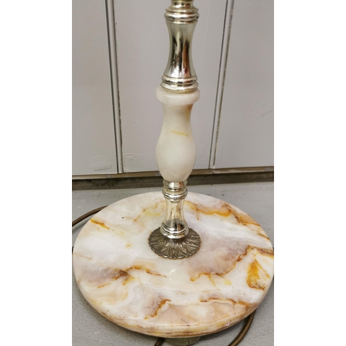 1562 - A tall, freestanding marble effect/brass lamp, with cream shade. PAT test failure as some damage to ... 