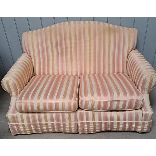 143 - A vintage-style, two-seater sofa, upholstered in striped fabric. Some minor staining & a small tear ... 