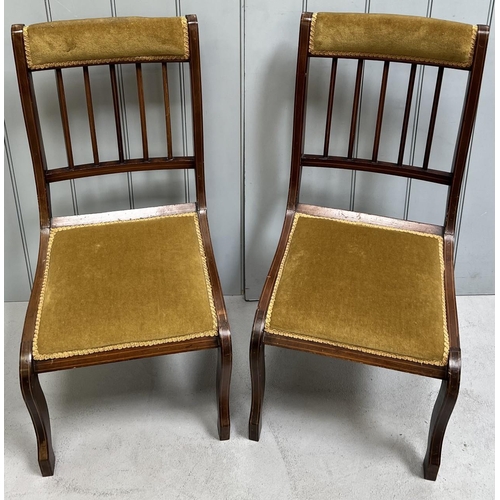 162 - A pair of spindle-backed hall chairs. Dimensions(cm) H87(37 to seat), W42, D54.