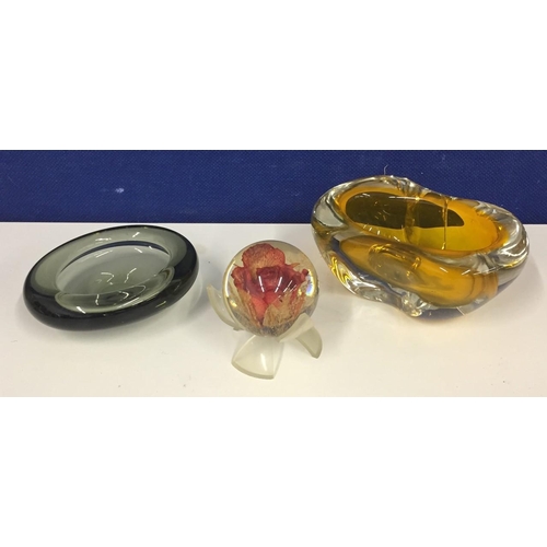 211 - A Hafod Grange rose paperweight, together with two ornamental glass art dishes.