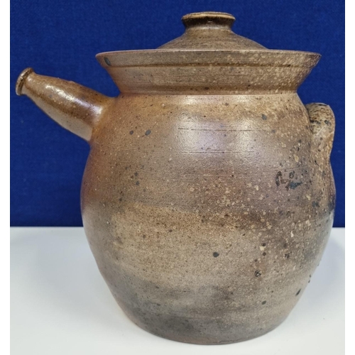 528 - A substantial pottery teapot, of bulbous form with a chunky spot. Unknown maker. Height 24cm.