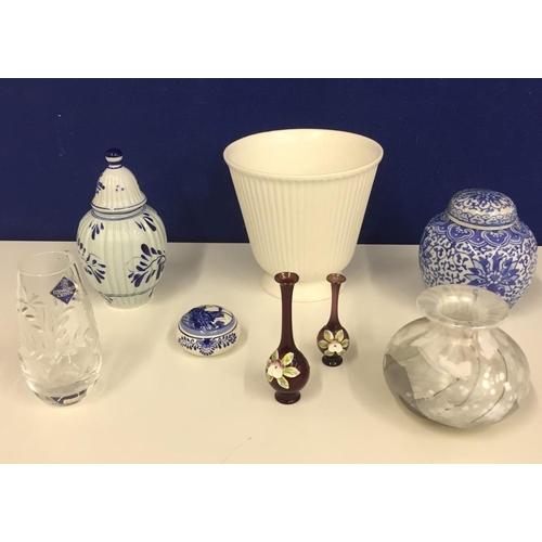 575 - A selection of ceramics. Includes a Wedgwood fluted plant holder, Isle of Wight glass vase, Delft, E... 