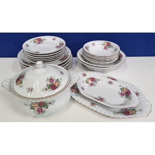 593 - A Polish 'Chodziez' fine porcelain, twenty-three piece dinner set, to include a large tureen, servin... 