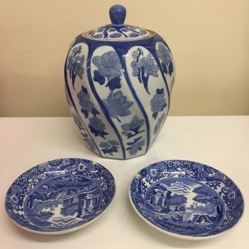 594 - A vintage blue & white patterned ginger jar, together with two Spode, willow pattern plates.