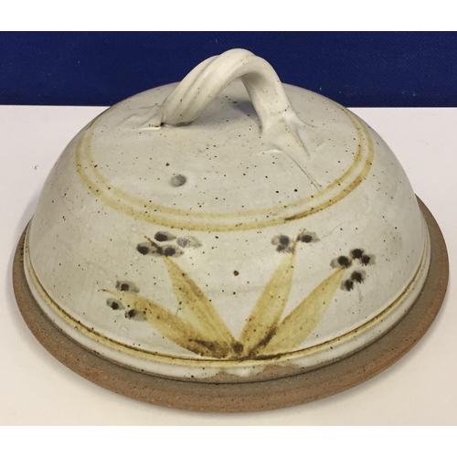 596 - A vintage studio pottery cheese board, with a domed/handled lid.