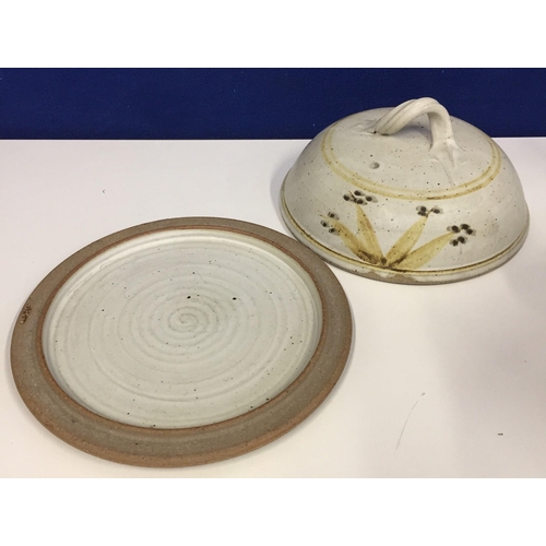 596 - A vintage studio pottery cheese board, with a domed/handled lid.