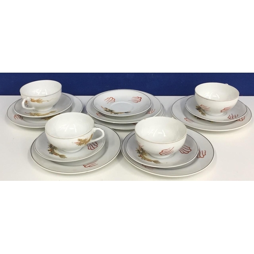 603 - A 'Top China' Dragonware tea set. Dragon decoration, with lithophane based cups.