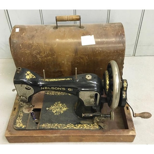 667 - A Nelson's 61 antique sewing machine, with case. Serial no. X1114.