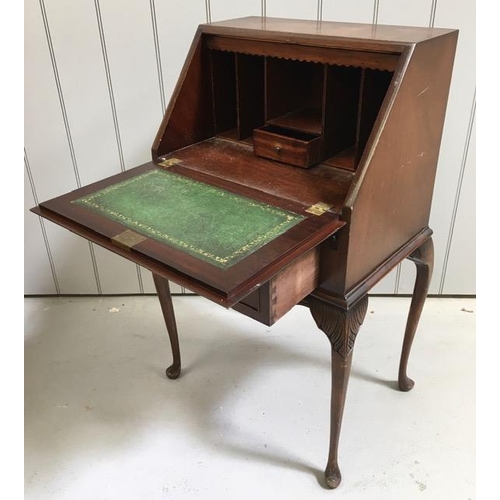 106 - An early 20th century, mahogany writing bureau. Fall-front reveals a leather writing insert & partia... 