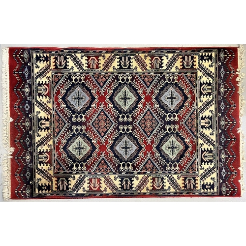 196 - A New Zealand, 100% wool, fringed rug, from Marks & Spencer. 178cm x 120cm.