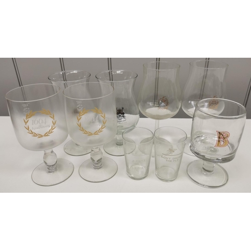 218 - A selection of nine items of branded glassware.