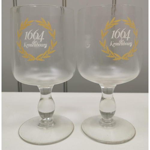 218 - A selection of nine items of branded glassware.