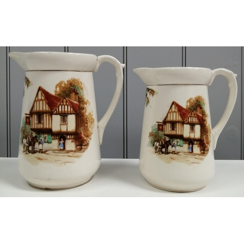 254 - A pair of graduated whiskey jugs, by 'Falcon Ware', each depicting a country inn scene. Height 17cm ... 