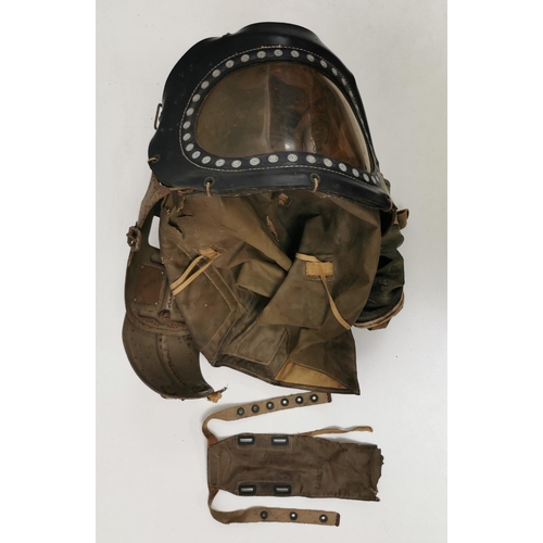 268 - A rare WWII child's gas mask. Showing signs of wear.