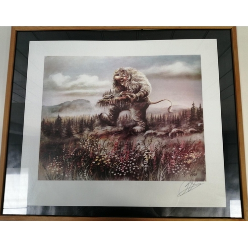 330 - A framed print of an artful giant troll carrying houses. Dated 1997 & signed. Framed dimensions 52cm... 