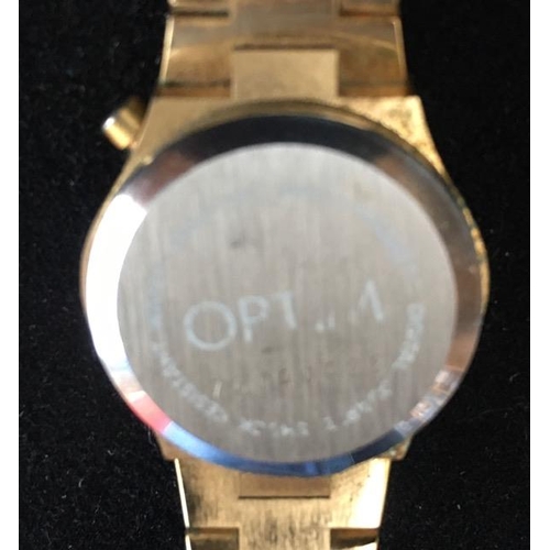 387 - A 1970's ladies LED watch, by 'Optim'. Gold-coloured. Case stamped '76040428'. Untested.