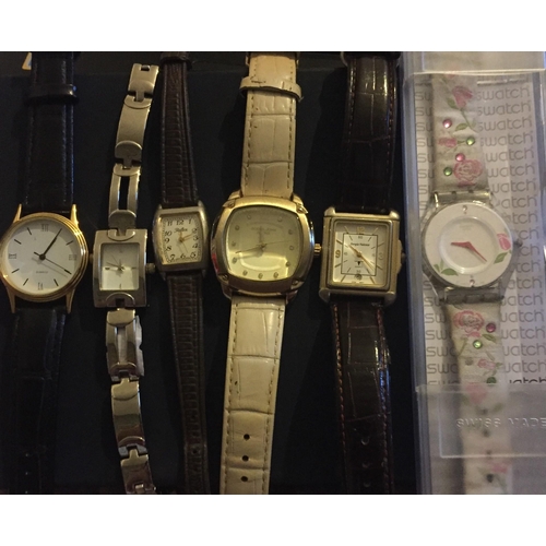 394 - A collection of six wristwatches. To include 'Swatch', 'Sergio Valente', 'Reflex' etc.