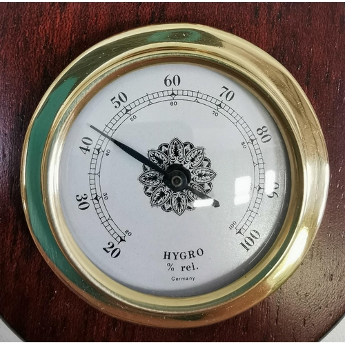 403A - A contemporary, unused wall barometer/hygrometer, by 'Staiger'. height 44cm.