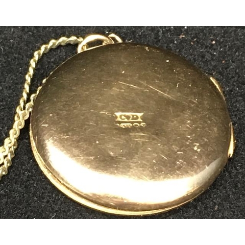 421 - A vintage, 9ct gold, engraved locket. Hallmarked to rear, weight approx. 4.5g. Complete with a yello... 