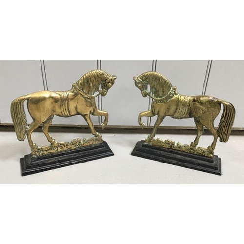 427 - A pair of 19th century, cast brass door stops. Each formed as a horse, on a stepped base. Dimensions... 