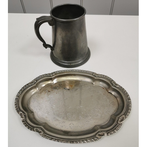 436 - A mixed lot of silver-plated, pewter & brass tableware. To include a serving dish, salver, sugar nip... 