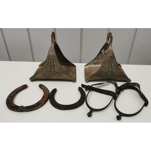 462 - A collection of vintage & antique equestrian items. To include iron & other stirrups, together with ... 