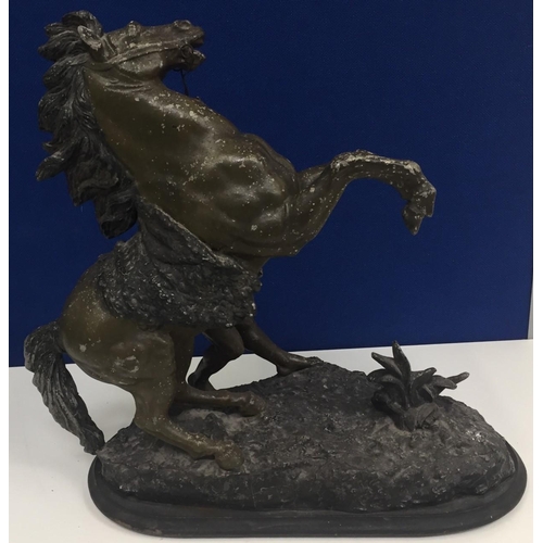 478 - A spelter Marly horse sculpture, after Guillaume Coustou. height 45cm.