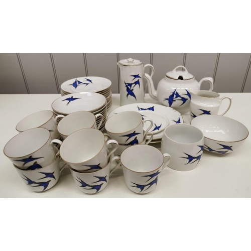 535 - A c.1930's Czechoslovakian tea set, with deep blue flying swallows design & gold-coloured detail. To... 