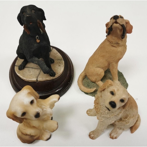 539 - A collection of eight ceramic dog figures.