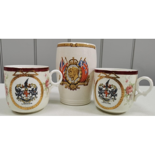 562 - A collection of three royalty memorabilia mugs. To include King George V & Queen Mary Silver Jubilee... 