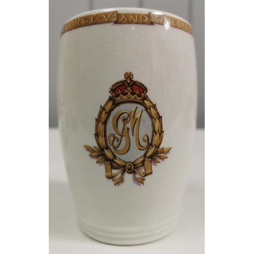 562 - A collection of three royalty memorabilia mugs. To include King George V & Queen Mary Silver Jubilee... 